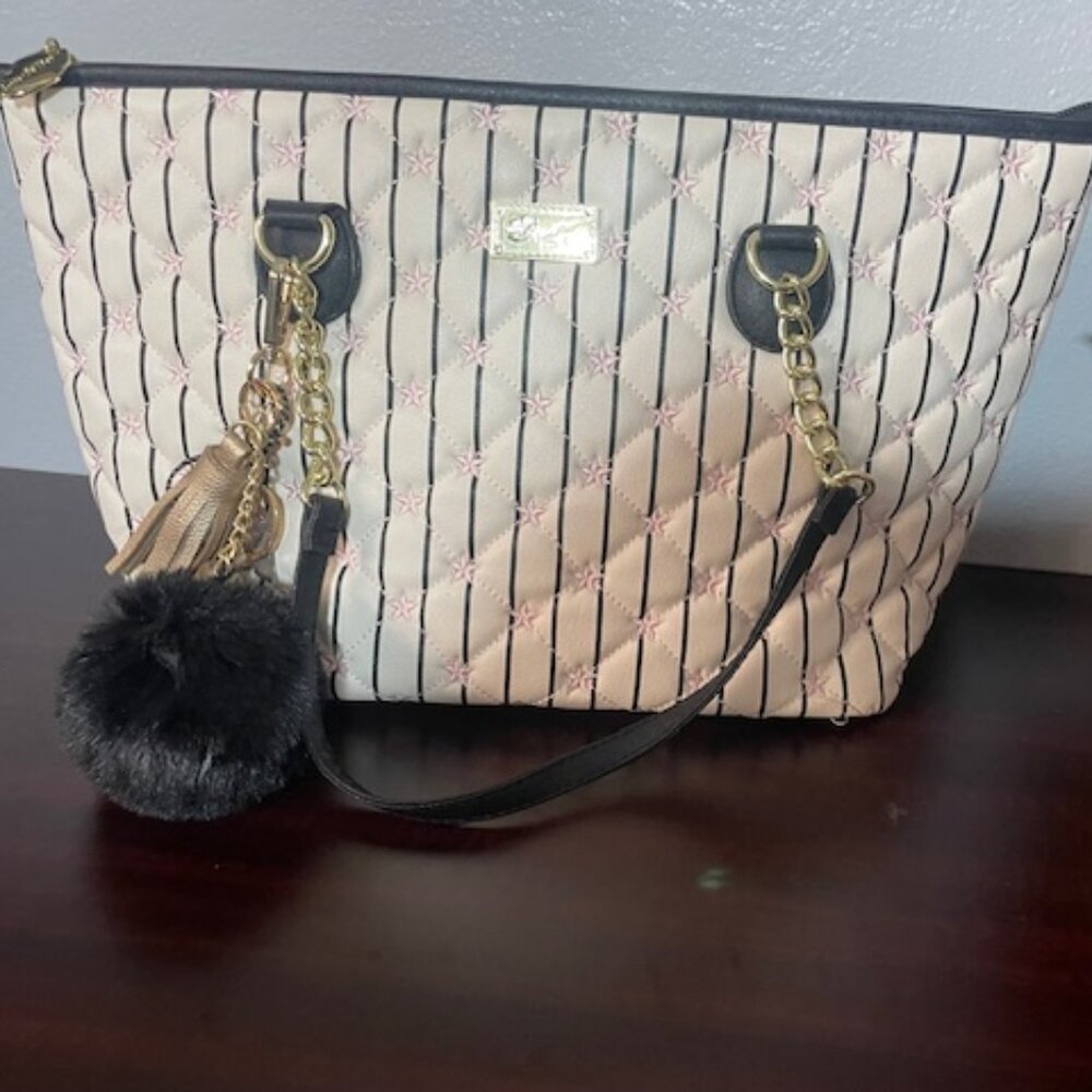 Betsey Tote: measurements 9" hide x 16" wide x  5 1/2" for the bottom.